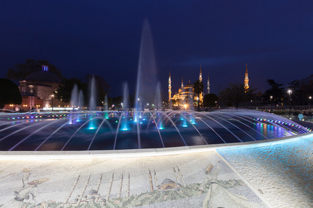 Fountain and the Sultanahmet Blue Mosque at night, Istanbul, Turkeyのeditorial素材