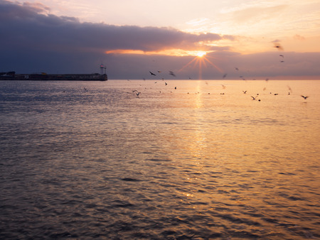 Lighthouse on sunriseの写真素材