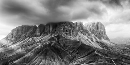 Black ad white panorama of Sassolungo mountain peaks, Italian Dolomitesの写真素材