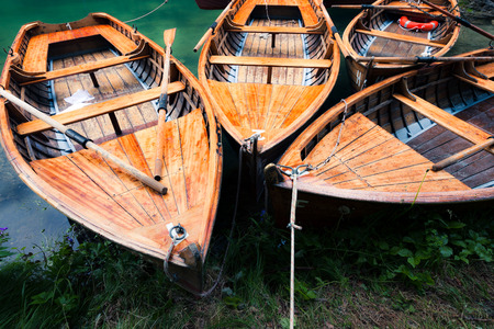 Boats at the lake. Lago di Braies, Italy