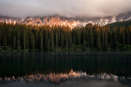 Lago di Carezza at sunset, Dolomites Alps, Italyの写真素材
