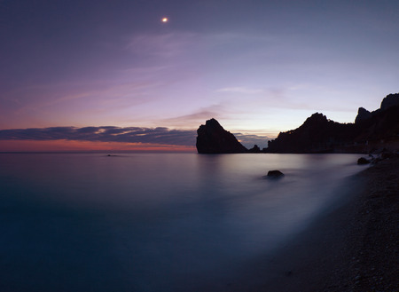 Rocky coastline after sunset. Crimea, Ukraineの写真素材
