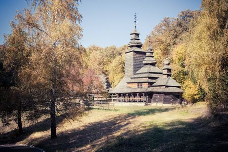 Old church in autumn forestのeditorial素材