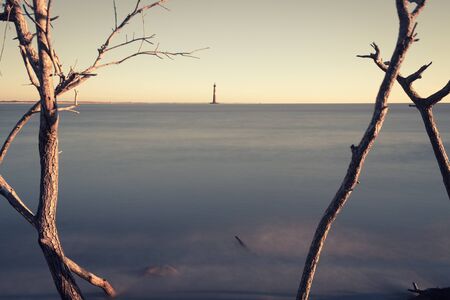 Morris Island Lighthouse at sunrise, South Carolina, USAの写真素材
