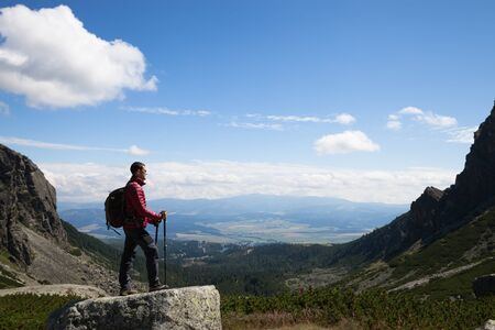 Man standing at the mountain top