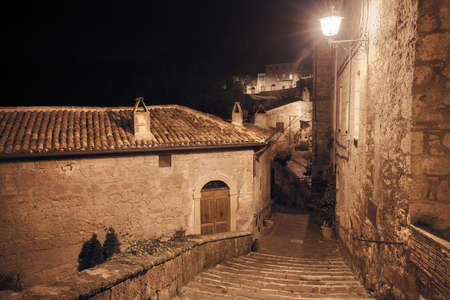 Medieval town street at nightの写真素材