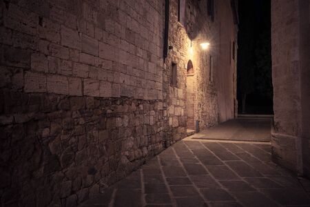 Old European street after darkの写真素材