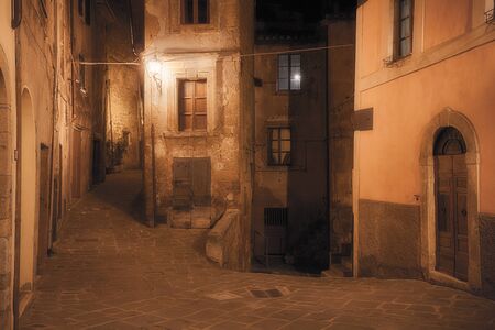 Medieval town street at nightの写真素材