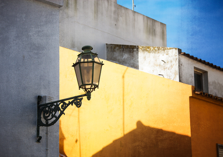 Vintage style image of old lantern. Mediterranean old townの写真素材