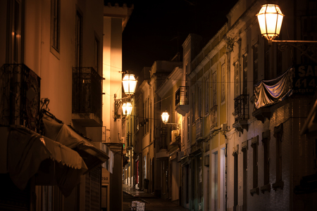 Street of old european town at nightの写真素材