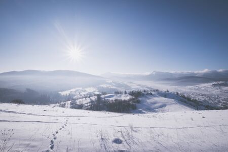 Winter mountain hills at sunny day
