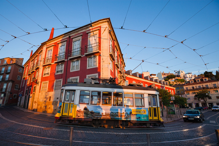 LISBON, PORTUGAL - MAY 3, 2017: Traditional yellow tram running at old streets of Lisbon, Portugalのeditorial素材