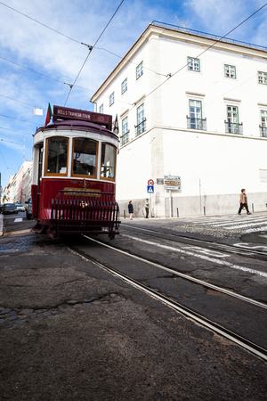 LISBON, PORTUGAL - : Traditional tourist tram at old streets, Lisbon old city, Portugal.のeditorial素材