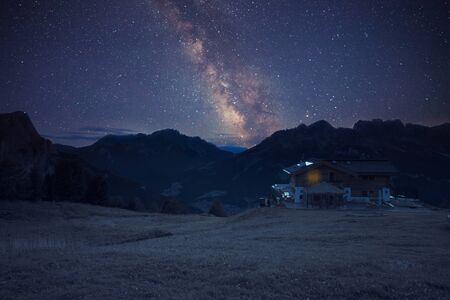Mountain shelter under starry night slyの写真素材