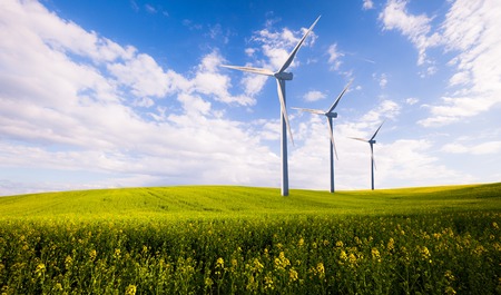 Eco green power station, wind turbines at the spring fieldの写真素材