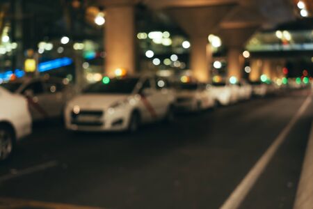 Abstract background of taxi blur bokeh in airport parking lotの写真素材