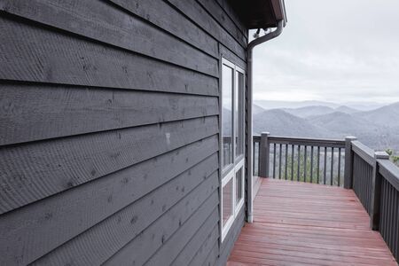 Rural wooden cottage cabin in the mountainsの写真素材