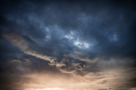 Colorful dramatic sky with cloud at sunsetの写真素材