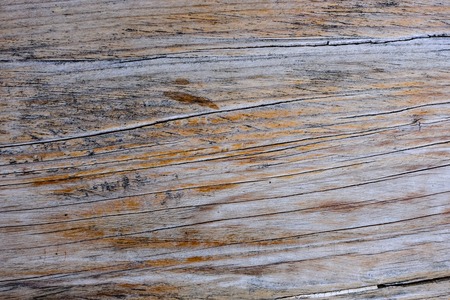 Brown dark scratched wooden cutting, chopping board. Wood texture.の写真素材