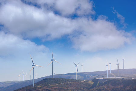 Wind power energy generation plant at the mountain hillの写真素材