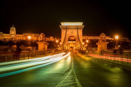 Chain Bridge and car traffic light at night, Budapest, Hungaryの写真素材