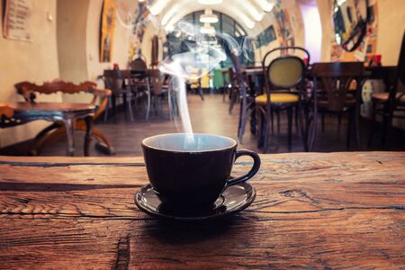 closeup of a cup of coffee at coffee shopの写真素材