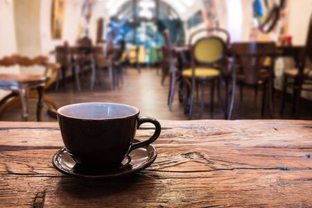 closeup of a cup of coffee at coffee shop