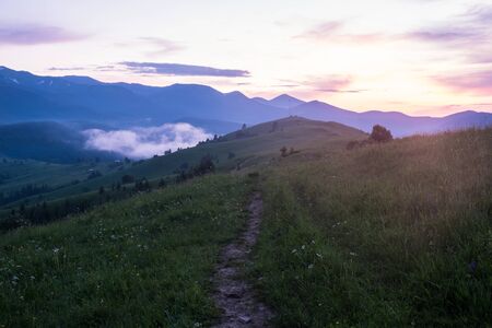 Majestic sunset in the mountains landscape. HDR imageの写真素材