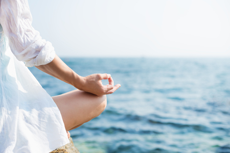 serenity and yoga practicing at sunset, meditationの写真素材