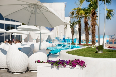 Empty seats at a beautiful place by the seaの写真素材