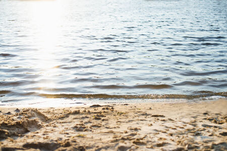 Wave of the sea on the sand beachの写真素材