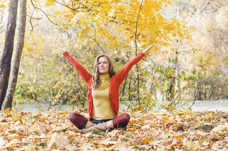 Beautiful young girl meditatingの写真素材