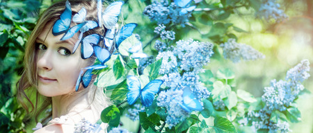 Beautiful Spring Girl with flowersの写真素材