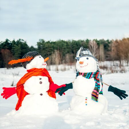 Couple of snowmenの写真素材