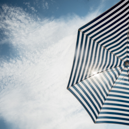 Beach umbrella on sunny dayの写真素材