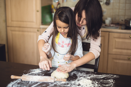 Mother and daughter cookingの写真素材
