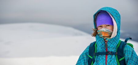 Woman portrait with backpack in the Carpathian mountains