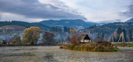 Mountain river with autumn leaves. Carpathian, Ukraineの写真素材