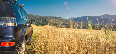 car for traveling with a mountain road