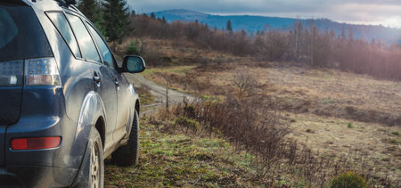 car for traveling with a mountain roadの写真素材