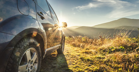 car for traveling with a mountain roadの写真素材