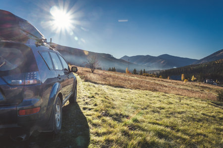 car for traveling with a mountain roadの写真素材