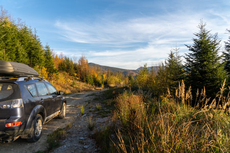 car for traveling with a mountain roadの写真素材
