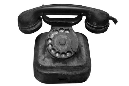 Old broken-down phone isolated on a white backgroundの写真素材