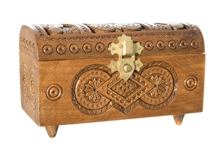 Wooden casket decorated with carvings isolated on white backgroundの写真素材