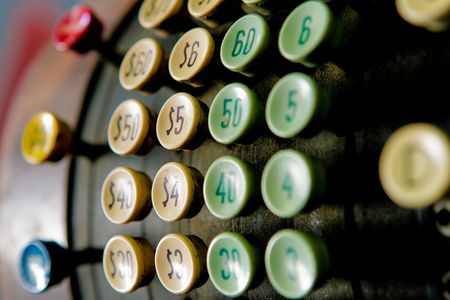 Close up of keys on an old cash register
