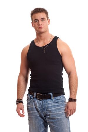Casual young man in black undershirt and jeans.の写真素材