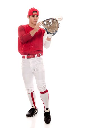 Baseball player fielding. Studio shot over white.の写真素材