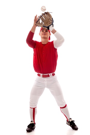 Baseball player fielding. Studio shot over white.の写真素材
