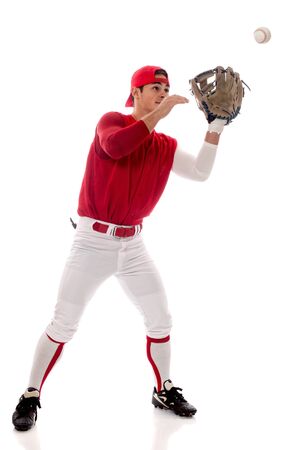 Baseball player fielding. Studio shot over white.の写真素材